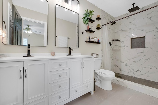 2222 3rd St, Rosenberg, TX 77471 - bathroom featuring a marble finish shower, ceiling fan, double vanity, and tile patterned flooring