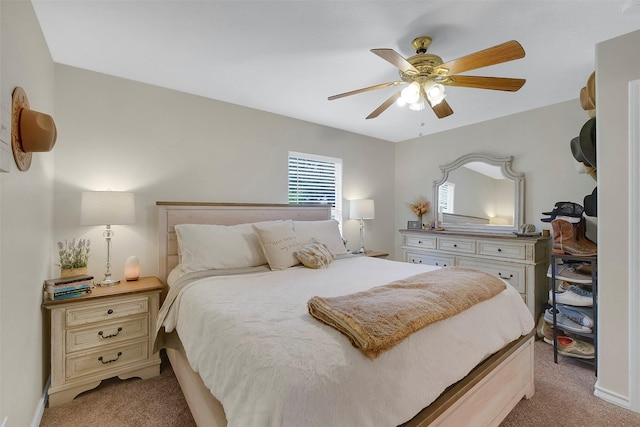 2222 3rd St, Rosenberg, TX 77471 - bedroom with light colored carpet and a ceiling fan