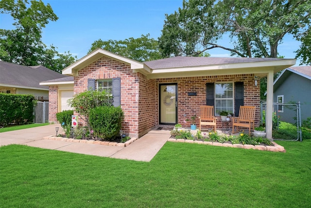 2222 3rd St, Rosenberg, TX 77471 - view of front of house with brick siding, an attached garage, and concrete driveway