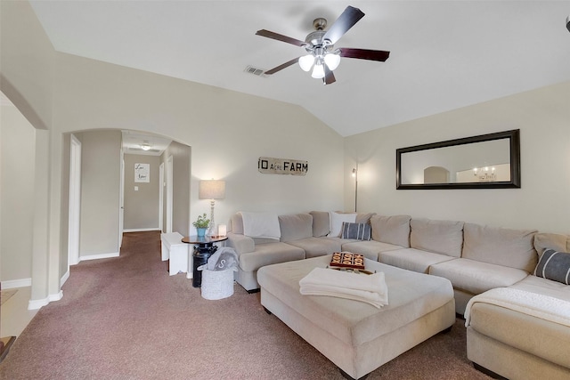 2222 3rd St, Rosenberg, TX 77471 - living room with a ceiling fan, arched walkways, lofted ceiling, and carpet