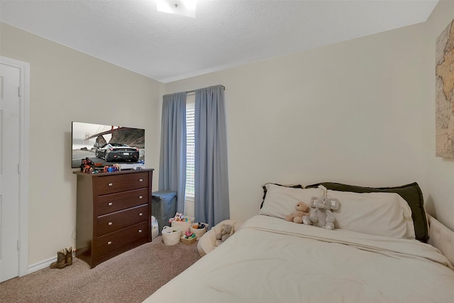 2222 3rd St, Rosenberg, TX 77471 - bedroom with carpet flooring and baseboards
