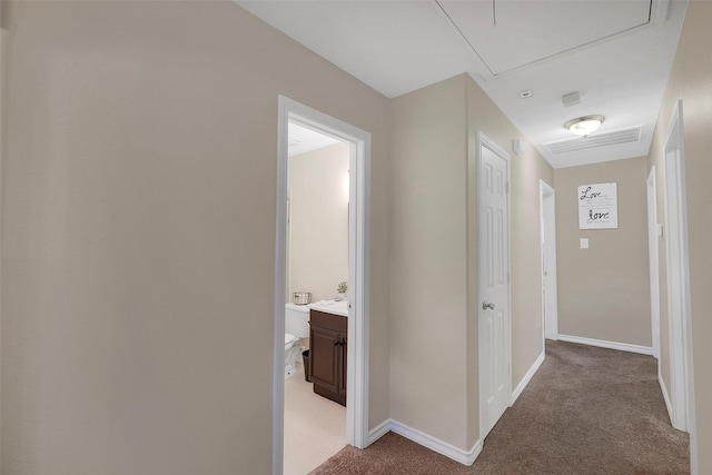 2222 3rd St, Rosenberg, TX 77471 - hallway with attic access and light colored carpet
