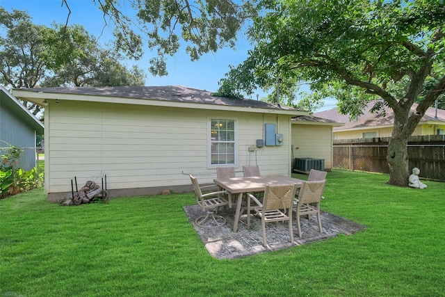 2222 3rd St, Rosenberg, TX 77471 - rear view of property featuring outdoor dining area