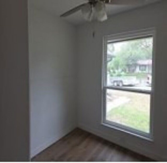 6402 Green Top Dr, San Antonio, TX 78233 - empty room featuring a ceiling fan and dark wood-style flooring