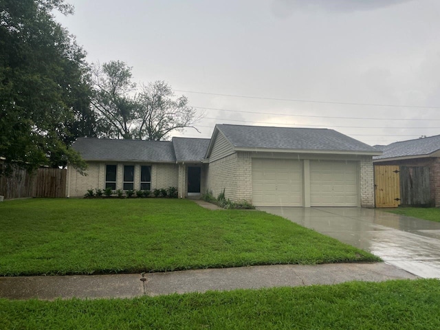 14207 Montaigne Dr, Cypress, TX 77429 - view of front of house with concrete driveway, brick siding, an attached garage, and roof with shingles