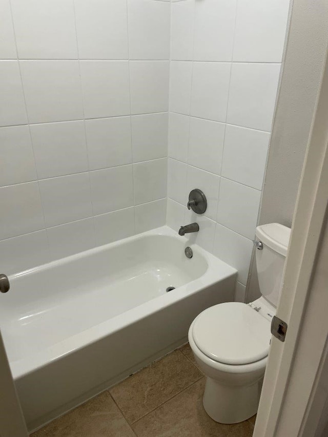 14207 Montaigne Dr, Cypress, TX 77429 - bathroom with tile patterned floors and tub / shower combination