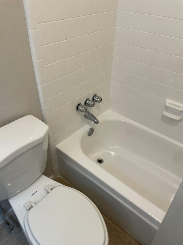 14207 Montaigne Dr, Cypress, TX 77429 - full bathroom featuring toilet and shower / washtub combination