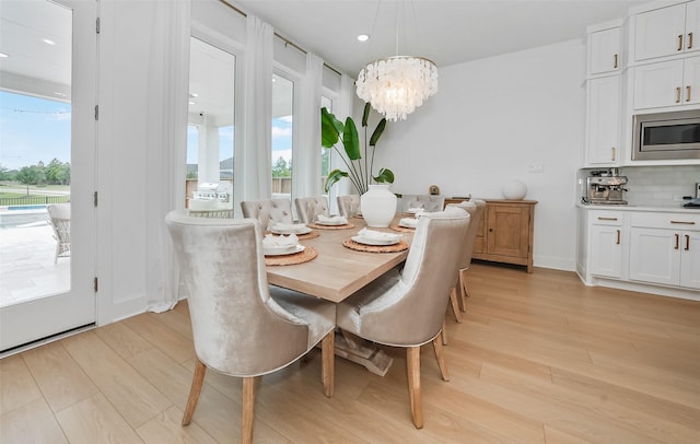 400 Horizon Light Ln, Katy, TX 77493 - dining area with plenty of natural light, light wood-style flooring, a chandelier, and recessed lighting