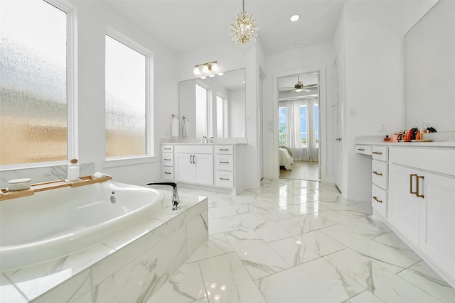 400 Horizon Light Ln, Katy, TX 77493 - bathroom with vanity, connected bathroom, a bath, ceiling fan, and marble finish floors