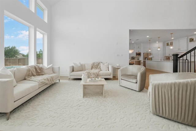 400 Horizon Light Ln, Katy, TX 77493 - living area featuring stairs and a high ceiling