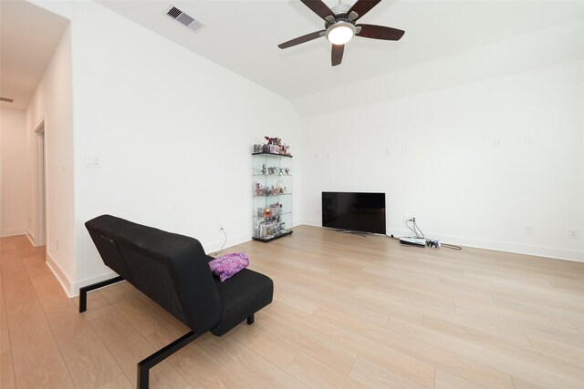 400 Horizon Light Ln, Katy, TX 77493 - living area with light wood-style flooring, a ceiling fan, and lofted ceiling