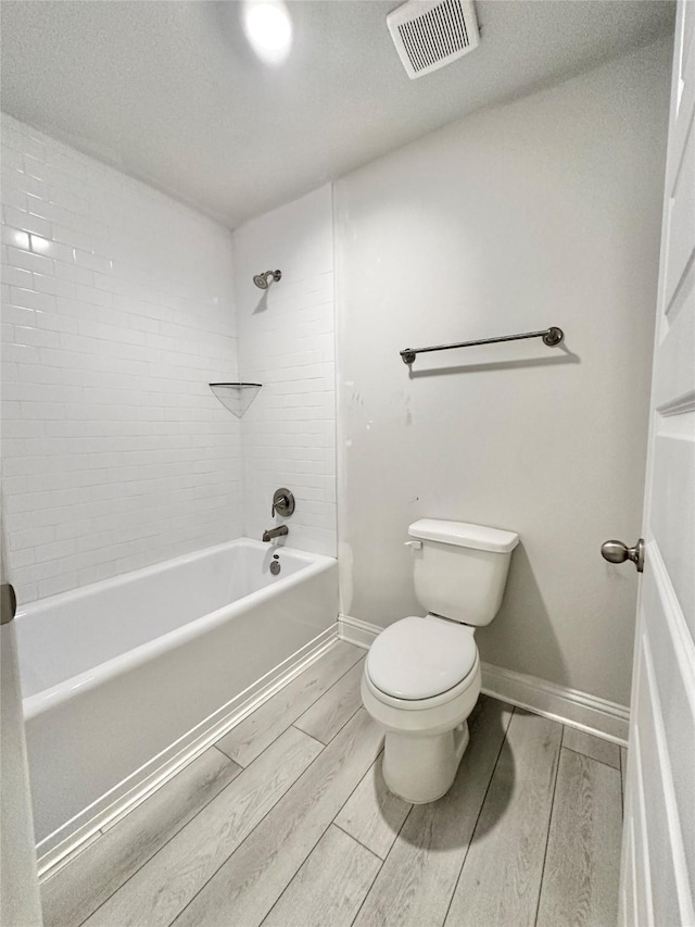 4301 Fenwick Rd, Texas City, TX 77591 - bathroom with wood tiled floors and tub / shower combination