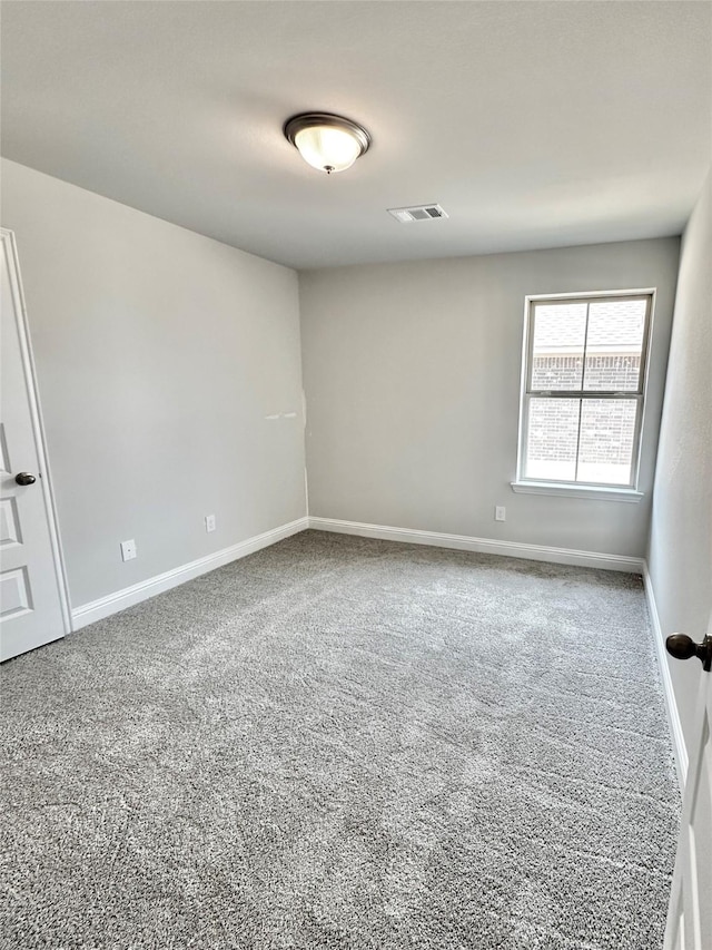 4301 Fenwick Rd, Texas City, TX 77591 - carpeted empty room with baseboards