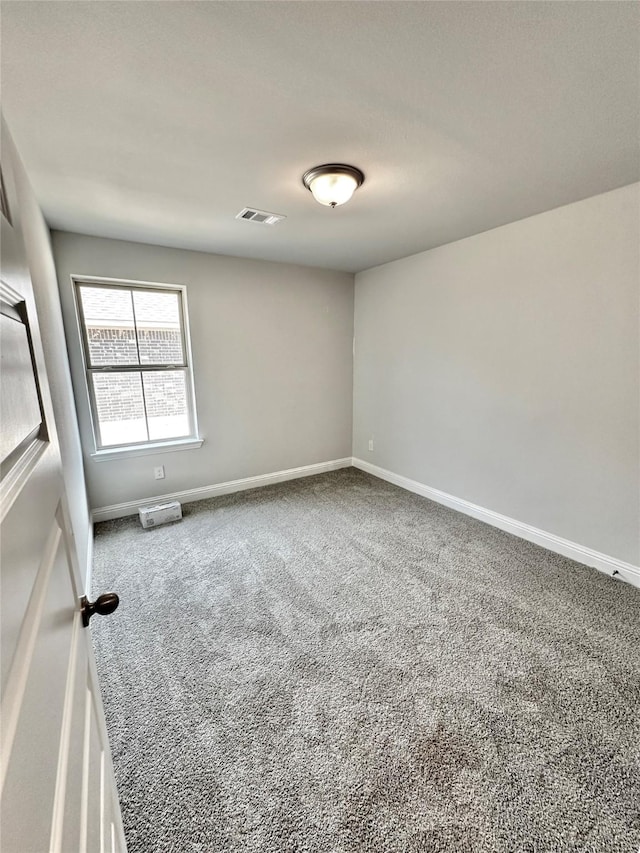 4301 Fenwick Rd, Texas City, TX 77591 - carpeted empty room featuring baseboards