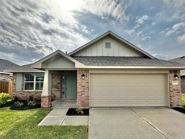 4301 Fenwick Rd, Texas City, TX 77591 - ranch-style house with brick siding, board and batten siding, driveway, an attached garage, and roof with shingles