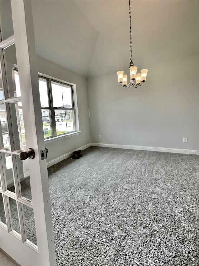 4301 Fenwick Rd, Texas City, TX 77591 - carpeted spare room with vaulted ceiling and a chandelier