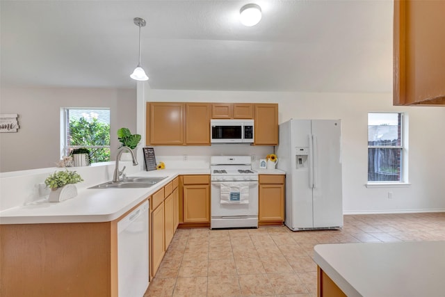 20806 Dewberry Creek Ln, Katy, TX 77449 - kitchen with white appliances, light tile patterned floors, light countertops, pendant lighting, and a peninsula