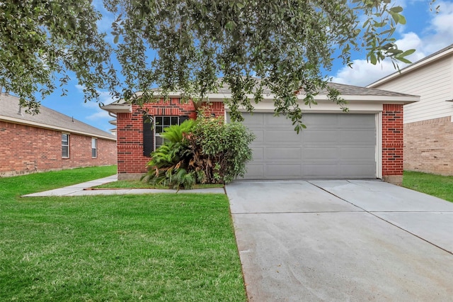 20806 Dewberry Creek Ln, Katy, TX 77449 - view of front of house featuring driveway, an attached garage, a front lawn, and brick siding