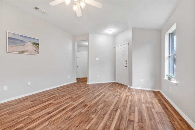20806 Dewberry Creek Ln, Katy, TX 77449 - spare room with a ceiling fan and light wood-style floors