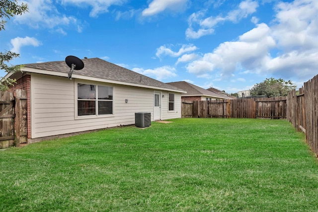20806 Dewberry Creek Ln, Katy, TX 77449 - back of property featuring a fenced backyard and a shingled roof