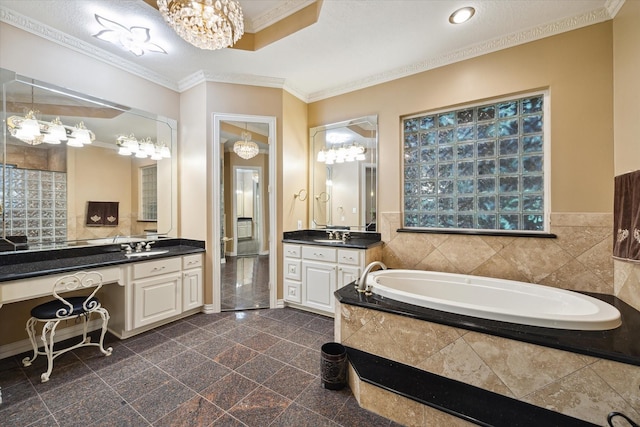 16919 Storybrook Forest Dr, Tomball, TX 77377 - bathroom with a bath, two vanities, ornamental molding, a chandelier, and granite tiled floors