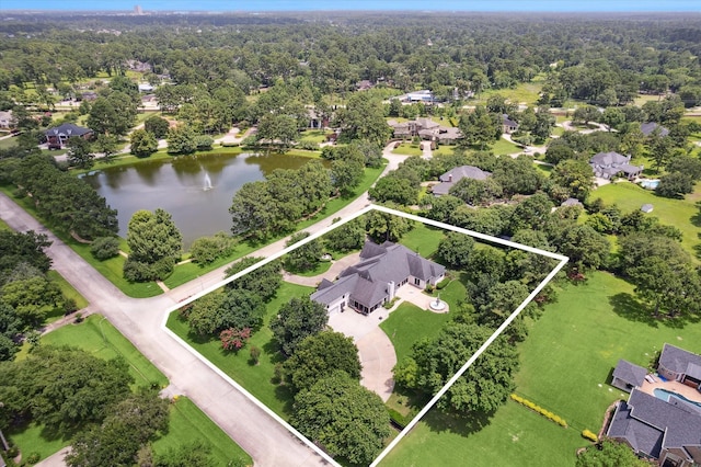16919 Storybrook Forest Dr, Tomball, TX 77377 - aerial view of residential area featuring property parcel outlined and a nearby body of water
