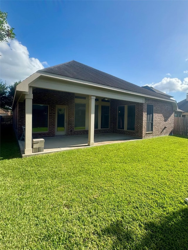 29018 Pinnacle Ridge Dr, Katy, TX 77494 - rear view of house featuring a patio area and brick siding