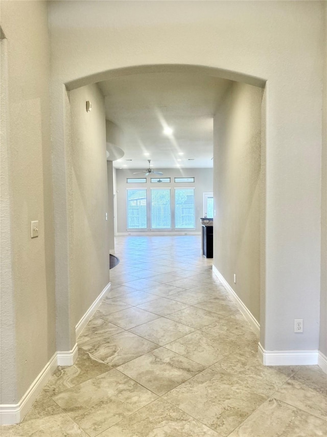 29018 Pinnacle Ridge Dr, Katy, TX 77494 - corridor featuring arched walkways and baseboards