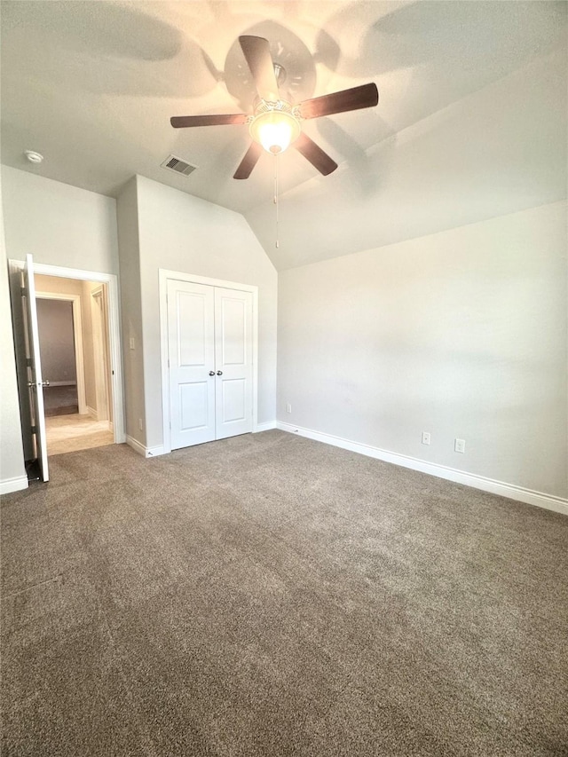 29018 Pinnacle Ridge Dr, Katy, TX 77494 - unfurnished bedroom featuring carpet, vaulted ceiling, a closet, and ceiling fan