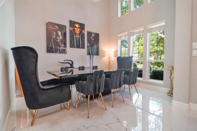 5515 E Terrace Gable Cir, Katy, TX 77494 - dining area with marble tiled floors and a towering ceiling