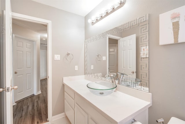 5515 E Terrace Gable Cir, Katy, TX 77494 - bathroom featuring vanity and wood finished floors