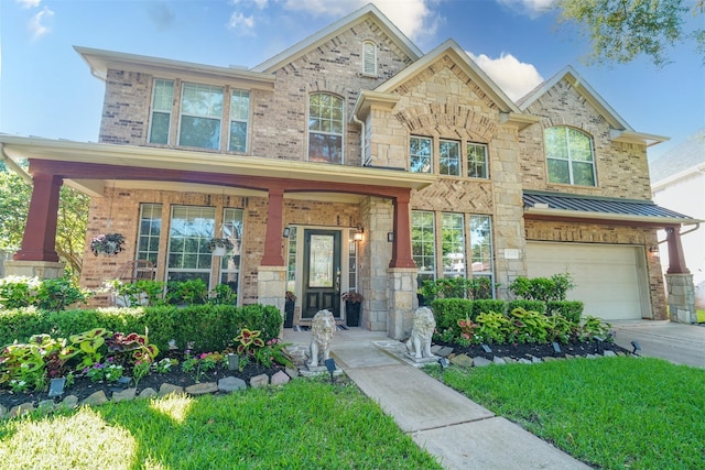 5515 E Terrace Gable Cir, Katy, TX 77494 - view of front of property with a garage, a porch, driveway, brick siding, and stone siding