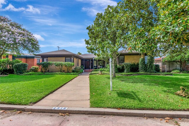 4316 Caduceus Pl, Galveston, TX 77550 - view of front facade featuring brick siding