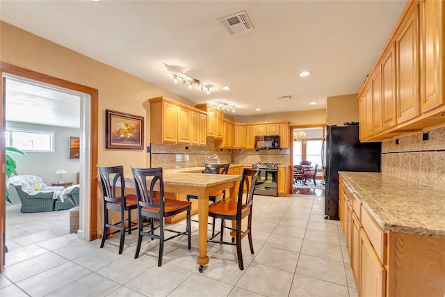 4316 Caduceus Pl, Galveston, TX 77550 - dining area with plenty of natural light, light tile patterned floors, and recessed lighting