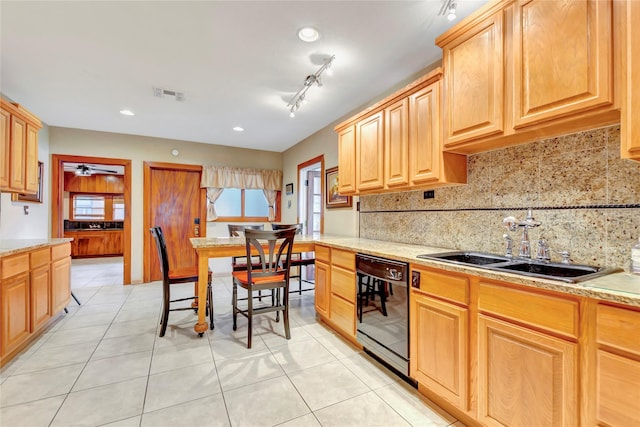 4316 Caduceus Pl, Galveston, TX 77550 - kitchen featuring dishwasher, decorative backsplash, healthy amount of natural light, light tile patterned flooring, and recessed lighting