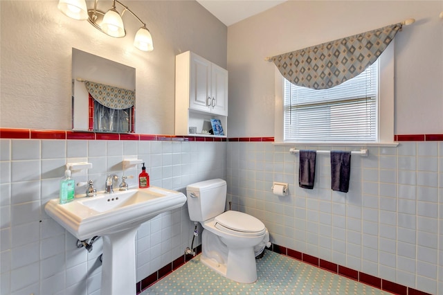 4316 Caduceus Pl, Galveston, TX 77550 - bathroom with tile walls and wainscoting