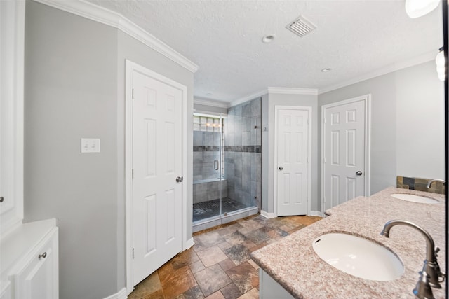 11607 Knobcrest Dr, Houston, TX 77070 - full bath with double vanity, a shower stall, stone finish floors, ornamental molding, and a textured ceiling