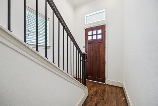 1124 W 24th St Unit B, Houston, TX 77008 - foyer entrance featuring wood finished floors, stairs, and ornamental molding