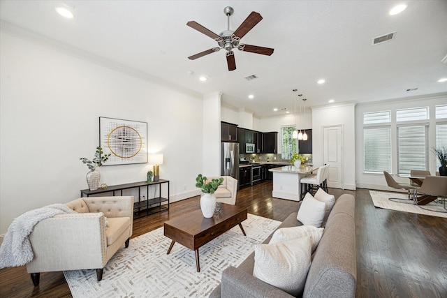 1124 W 24th St Unit B, Houston, TX 77008 - living area featuring a ceiling fan, dark wood finished floors, recessed lighting, and crown molding
