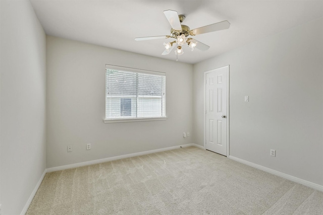 8006 Sports Haven Dr, Humble, TX 77346 - spare room featuring light carpet and a ceiling fan
