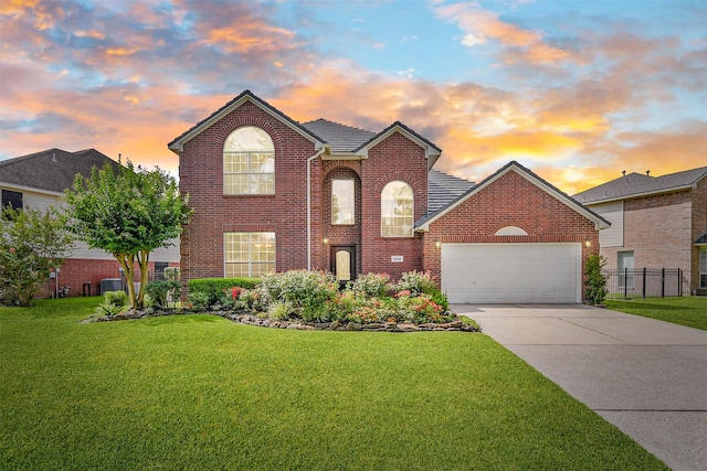 8006 Sports Haven Dr, Humble, TX 77346 - traditional-style home featuring concrete driveway, a garage, and brick siding