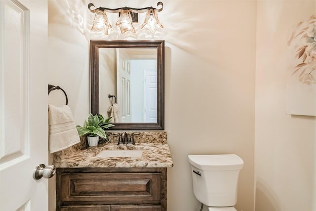 8006 Sports Haven Dr, Humble, TX 77346 - bathroom featuring toilet and vanity