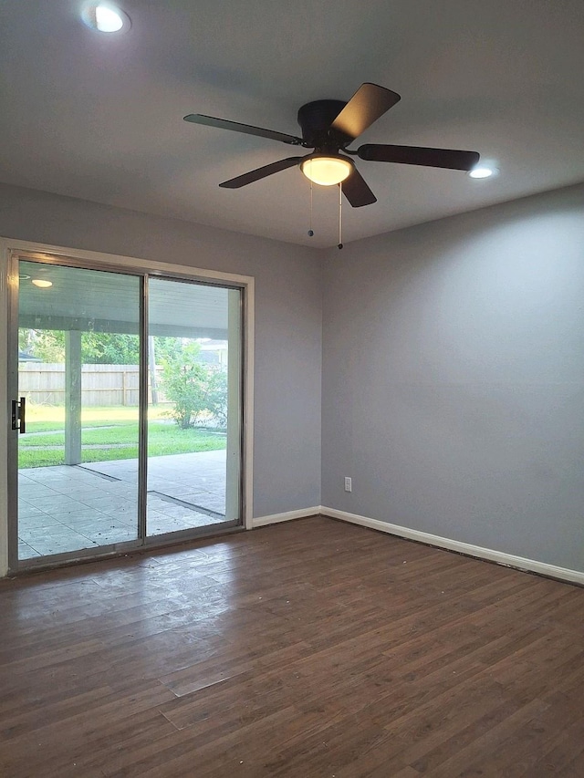 7807 Bellerive Dr, Houston, TX 77036 - spare room with dark wood-style floors, ceiling fan, and recessed lighting