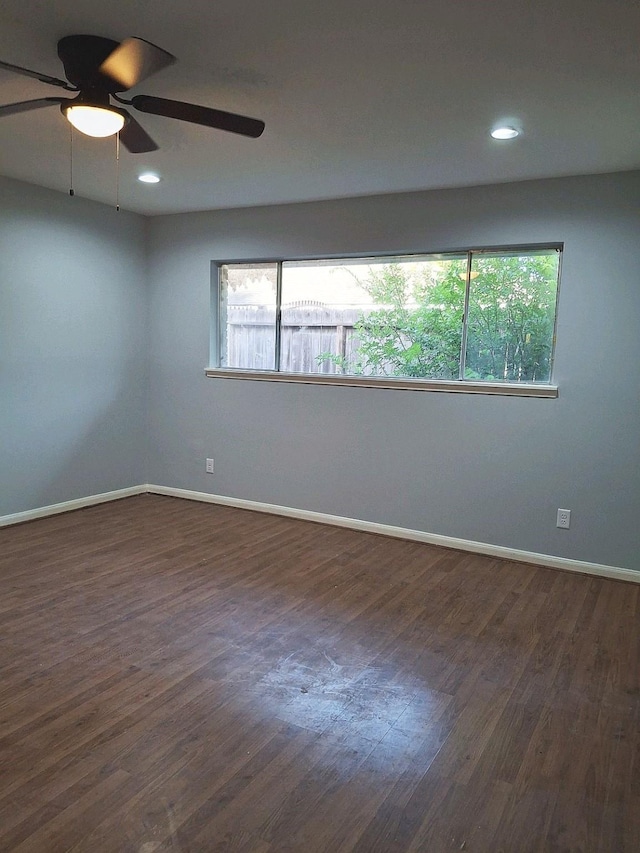 7807 Bellerive Dr, Houston, TX 77036 - spare room with dark wood-type flooring, a ceiling fan, and recessed lighting