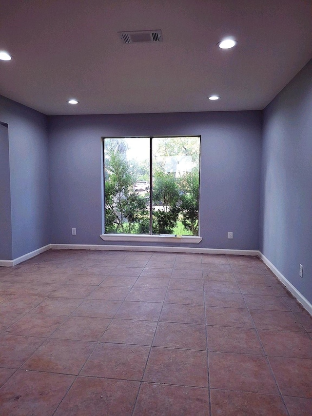 7807 Bellerive Dr, Houston, TX 77036 - spare room with recessed lighting and tile patterned flooring