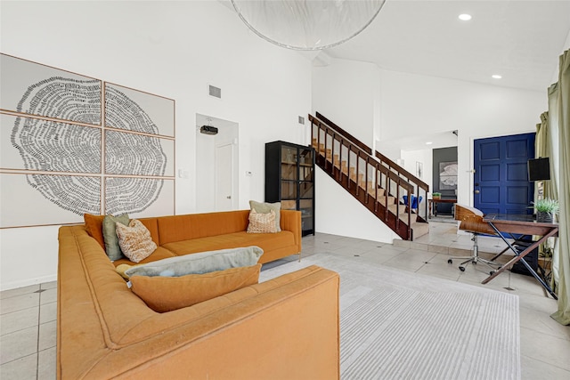 8727 Vinkins Rd, Houston, TX 77071 - living room with stairs, light tile patterned floors, high vaulted ceiling, and recessed lighting