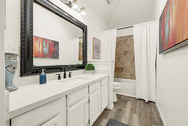 8727 Vinkins Rd, Houston, TX 77071 - full bathroom featuring wood finished floors, vanity, and shower / tub combo with curtain
