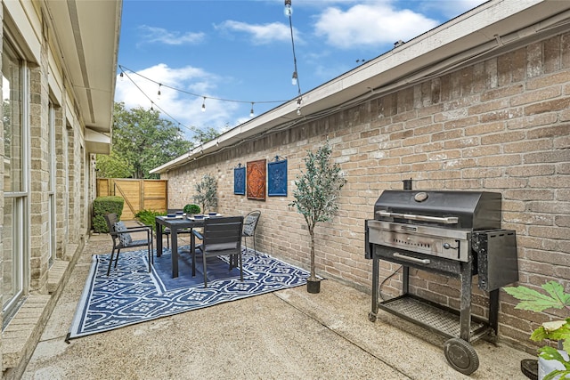 8727 Vinkins Rd, Houston, TX 77071 - view of patio featuring grilling area and outdoor dining space