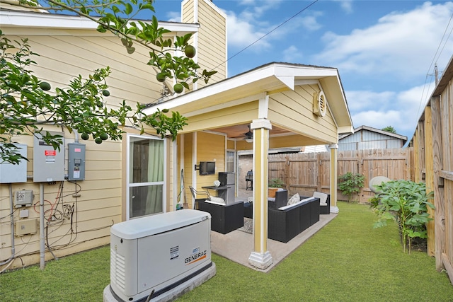 8727 Vinkins Rd, Houston, TX 77071 - fenced backyard featuring an outdoor hangout area, ceiling fan, and a patio