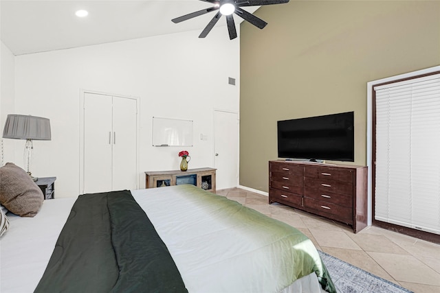 8727 Vinkins Rd, Houston, TX 77071 - bedroom with high vaulted ceiling, light tile patterned floors, ceiling fan, and recessed lighting
